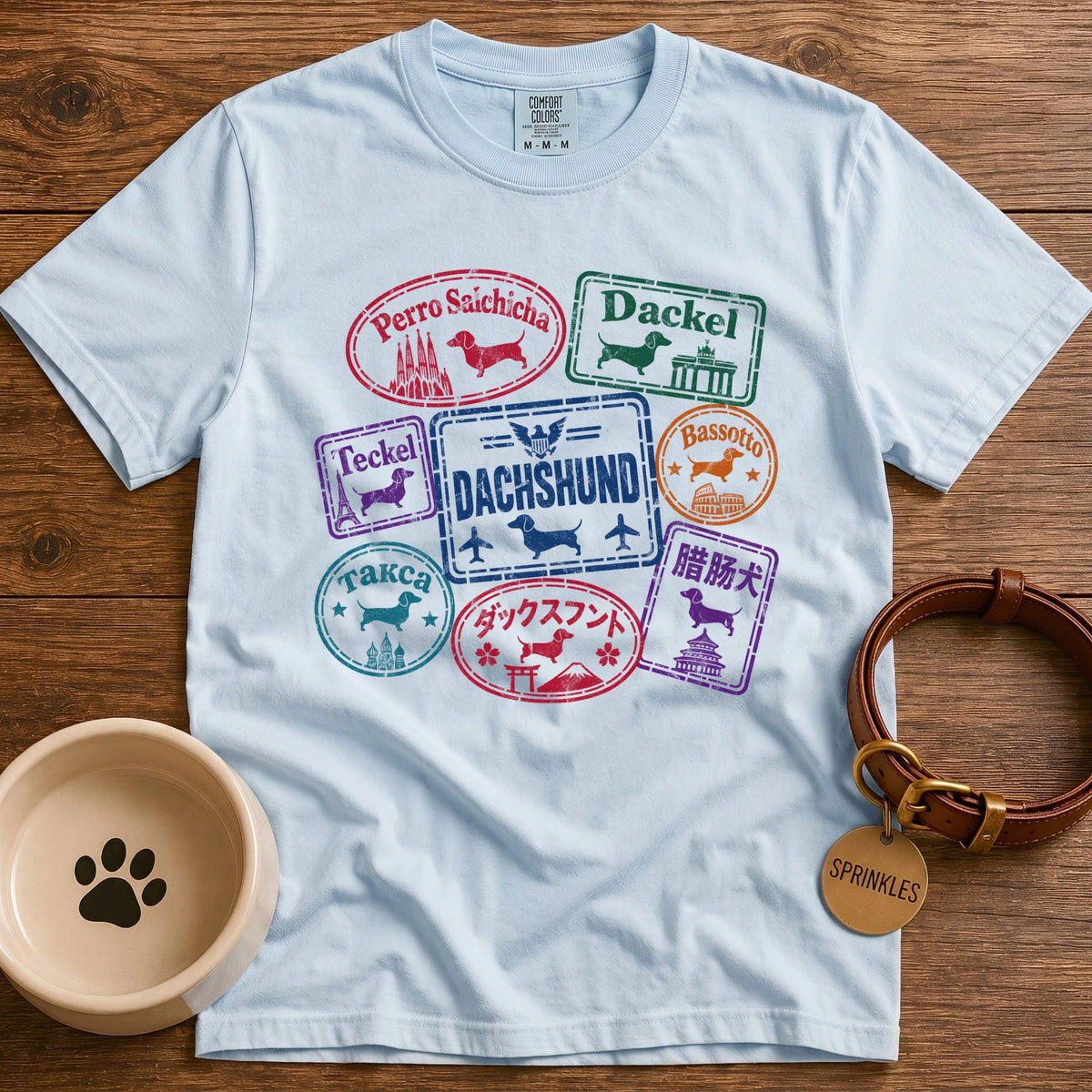 Chambray Dachshund t-shirt design with passport stamps reading dachshund in Spanish, German, French, Italian, Russian, Japanese and Chinese