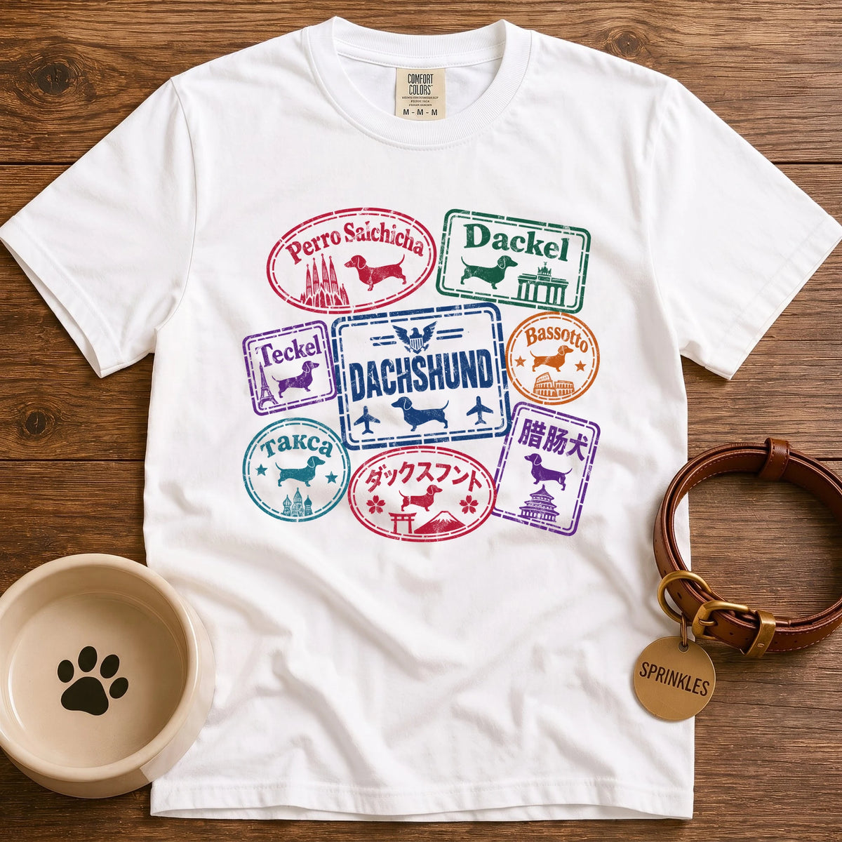 Dachshund t-shirt design with passport stamps reading dachshund in Spanish, German, French, Italian, Russian, Japanese and Chinese